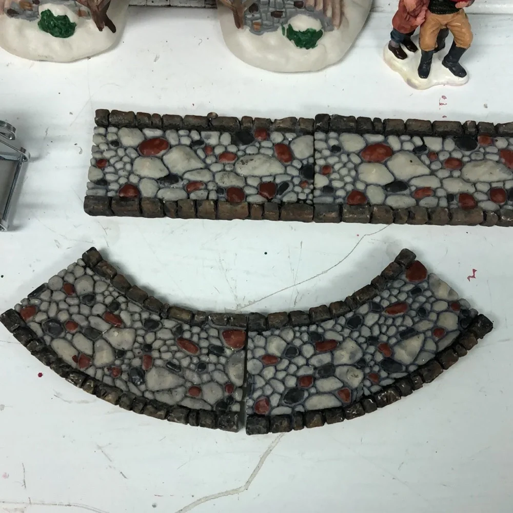 Lot of Christmas village cobblestone road bridge family in slay Lemax father son